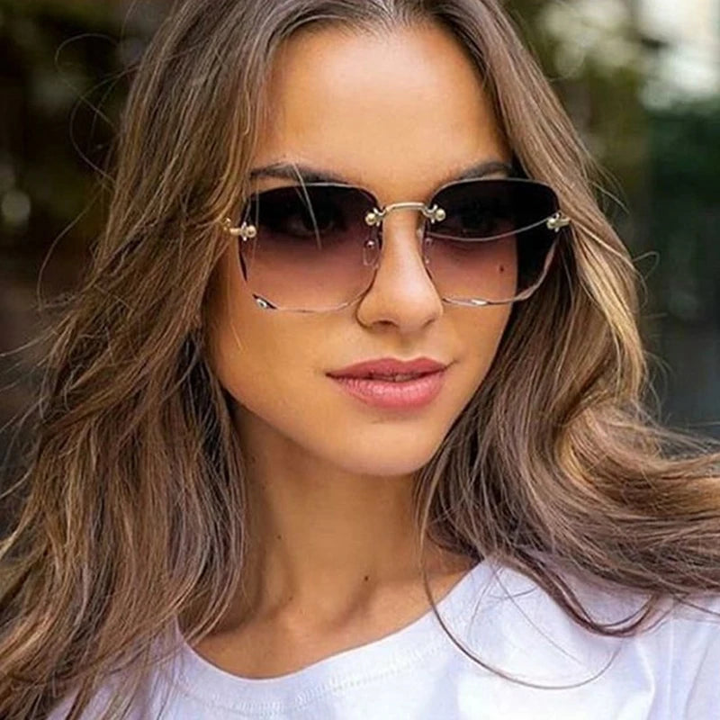 2024 New Rimless Women's Sunglasses Fashion Gradient Lenses Sun glasses Lady Vintage Alloy Legs Classic Designer Shades UV400