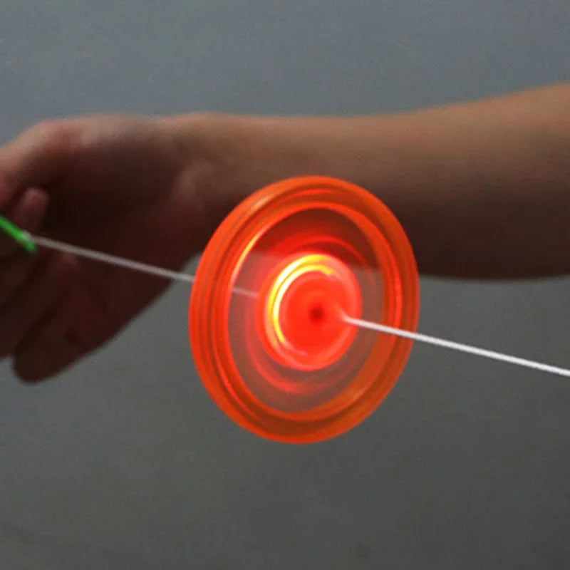 1pcs Kids Creative Bracing Wire Luminous Toy Flywheel Flash Spinning